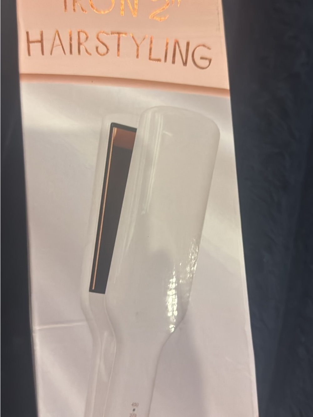 White Hair Styling Flat Iron - Brand Not Visible